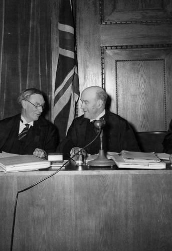 Members of the Nuremberg Tribunal Iona Nikitchenko (USSR), Norman Birkett and Geoffrey Lawrence (UK) and Francis Biddle (US)