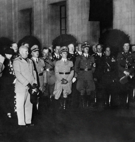 Photo taken in September 1937, of German 3d Reich Chancellor Adolf Hitler (L), Italian Fascist state's head Benito Mussolini (3dL) and Krupp steel corporation's director Gustav Krupp (R), during their visit of the Krupp factory in Essen. Mussolini signed an alliance with Hitler 28 September 1937
