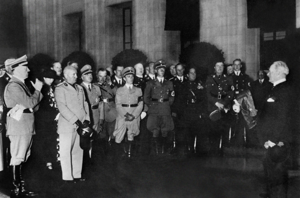 Photo taken in September 1937, of German 3d Reich Chancellor Adolf Hitler (L), Italian Fascist state's head Benito Mussolini (3dL) and Krupp steel corporation's director Gustav Krupp (R), during their visit of the Krupp factory in Essen. Mussolini signed an alliance with Hitler 28 September 1937