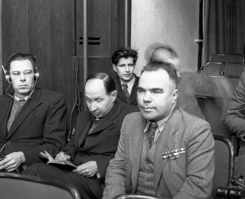 Writer Vsevolod Vishnevsky and artists of the Kukryniksy collective Porfiry Krylov and Mikhail Kupriyanov (from right to left) sit in a courtroom. The Nuremberg trial.