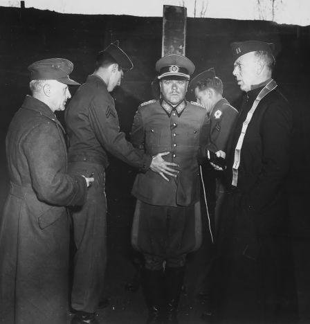 German General Anton Dostler is tied to a stake before his execution by a firing squad in the Aversa stockade. The General was convicted and sentenced to death by an American military tribunal. Aversa, Italy., 12/01/1945