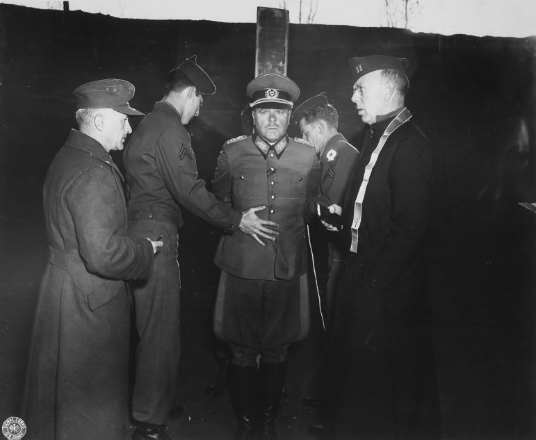 German General Anton Dostler is tied to a stake before his execution by a firing squad in the Aversa stockade. The General was convicted and sentenced to death by an American military tribunal. Aversa, Italy., 12/01/1945