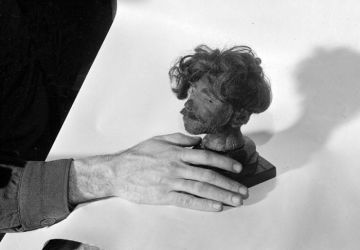 US prosecutor Thomas Dodd presents the severed head of a Polish prisoner at the Buchenwald concentration camp in the Courtroom. The camp commandant Karl Koch used it as a paperweight.