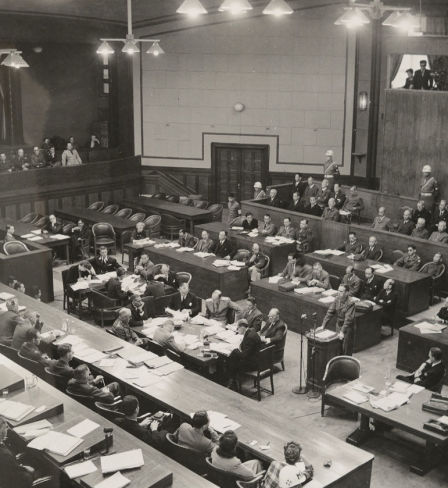 Maj. Ben Bruce Blakeney, American Associate Counsel for Defendant Shigenori Togo, addresses the court  at the International War Crimes Tribunal for the Far East, Ichigaya Court, Tokyo. 14 May 1946.