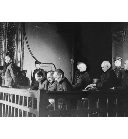 Friedrich Jeckeln (standing, at left) SS war criminal and murder, on trial in 1946 in Riga. Other defendants from left to right : 2. Generalmajor Hans Paul Kupper, 3. Generalleutnant Siegfried Ruff, 4. SA-Standartenführer Alexander Bocking, 5. Generalleutnant Wolfgang von Ditfurth, 6. Generalleutnant Albrecht Baron Digeon von Monteton, 7. Generalmajor Bronislav Pavel.