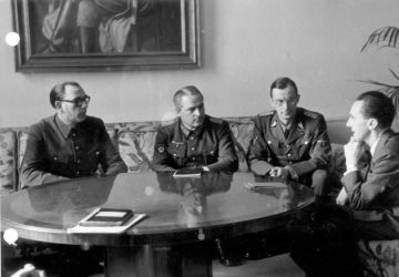 Generals Andrei Vlasov and Georgy Zhilenkov meeting Joseph Goebbels, Minister for Public Enlightenment and Propaganda of the Third Reich, 28 February 1945. Bundesarchiv, Bild 183-H27774 / CC-BY-SA 3.0