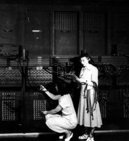 US Army photos from the archives of the ARL Technical Library: Two women wiring the right side of the ENIAC with a new program, in the "pre- von Neumann" days. Standing: Marlyn Wescoff Crouching: Ruth Lichterman. "US Army Photo" from the archives of the ARL Technical Library 1946. 