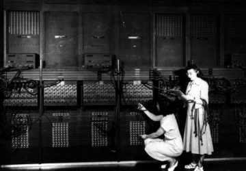 US Army photos from the archives of the ARL Technical Library: Two women wiring the right side of the ENIAC with a new program, in the "pre- von Neumann" days. Standing: Marlyn Wescoff Crouching: Ruth Lichterman. "US Army Photo" from the archives of the ARL Technical Library 1946. 