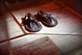Children's shoes. A piece of the exposition “No measure, no name, no comparison” from collections of the State Memorial Museum of Leningrad Defence and Siege © Photo by Dmitri Alekseev