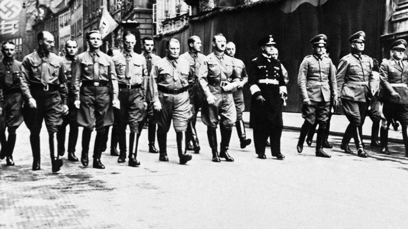 Adolf Hitler was in Munich on Nov. 9, 1938 with 3,000 “old fighters” from all parts of Germany to commemorate the unsuccessful Nazi uprising of 1923. Hitler marches with Goering, left, and other Nazi leaders in Munich during anniversary celebration.
