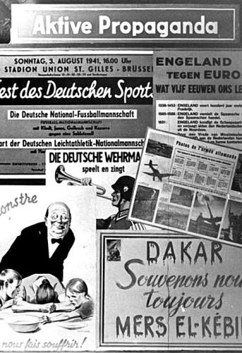 Wandtafel in einer Ausstellung über die Arbeit der Propaganda-Abteilung in Belgien, um Dezember 1941/Januar 1942