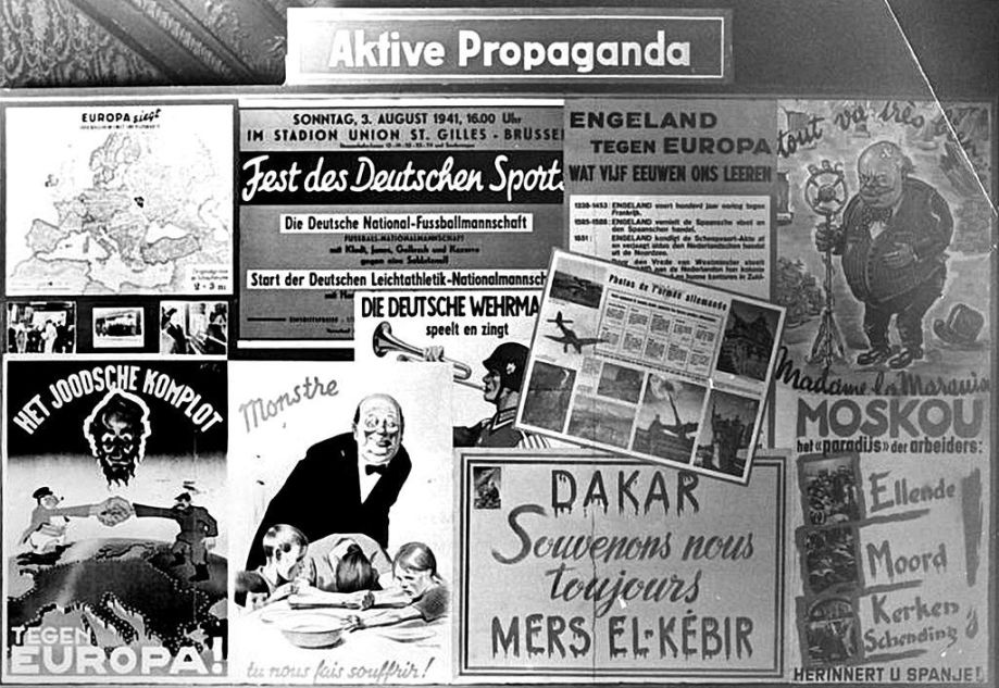 Wandtafel in einer Ausstellung über die Arbeit der Propaganda-Abteilung in Belgien, um Dezember 1941/Januar 1942
