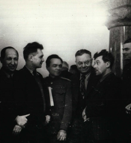Procurator General of the Soviet Union Roman Rudenko on a smoke break with journalists.