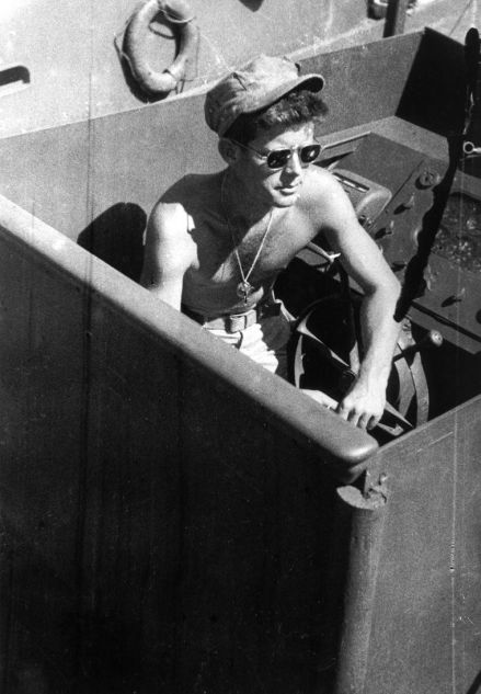 John Kennedy on his navy patrol boat, the PT-109, in 1943