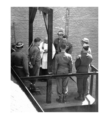 Catholic priest Karl Morgenschweis praying for a prisoner on the gallows at Landsberg Prison