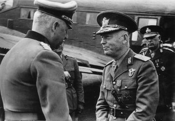 Marshal Erich von Manstein (left) welcomes Marshal Ion Antonescu to the field airfield.