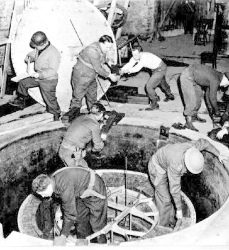 Dismantling the German experimental nuclear pile at Haigerloch, 50 km S.W of Stuttgart, April 1945.
