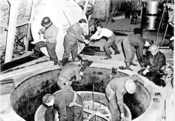 Dismantling the German experimental nuclear pile at Haigerloch, 50 km S.W of Stuttgart, April 1945.