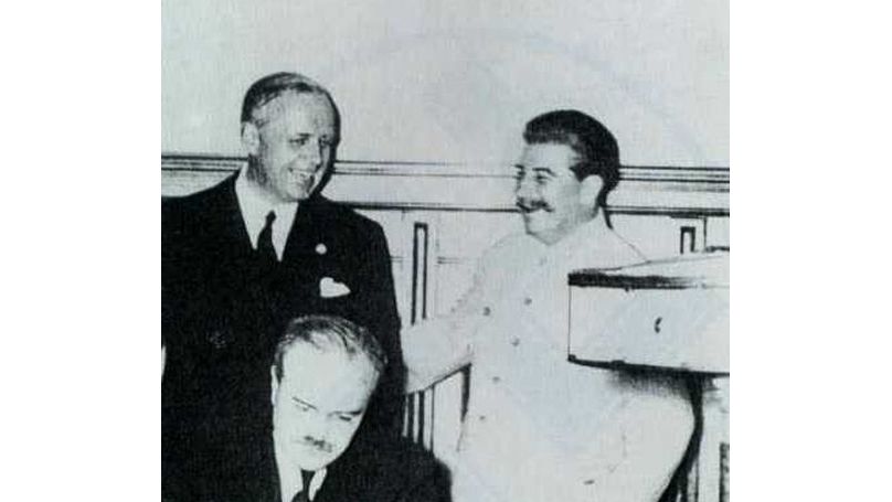German Ambassador Joachim von Ribbentrop (left), Vyacheslav Molotov (sitting) and Joseph Stalin (right) during the signing of the Treaty of Non-Aggression between Germany and the USSR, 28 September 1939 