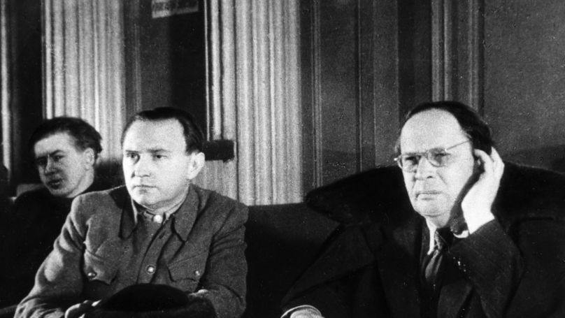 Alexei Tolstoy (right), a Soviet writer, and Dmitry Kudryavtsev, Head of the Investigative Commission for Nazi Crimes. An Emergency Commission meeting.