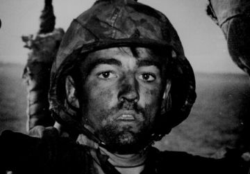 An exhausted U.S. Marine, Private T.J. Miller, exhibits the 2,000-yard stare after two days of constant fighting at the Battle of Eniwetok, February 194