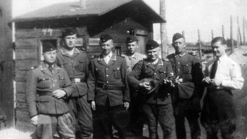 Group portrait of graduates of the SS Trawniki training camp, 1942. The Trawniki men helped Wehrmacht and SS troops to suppress uprisings in the Warsaw Ghetto and served in concentration camps, including Treblinka.